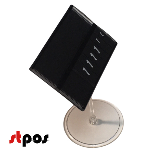 00 Кассета цен формата A7. Шрифт — белый Brush (имитация написания кистью). Цвет блокнотов и кассеты — чёрный. Количество цифр целой части цены — 4. На фото держатель кассеты расположен под наклоном. Ракурс съёмки — небольшой поворот.