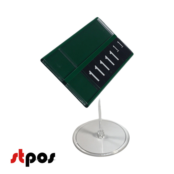 00 Кассета цен формата A7L на прозрачном держателе и прозрачной круглой ножке. Шрифт — Regular беый. Цвет блокнотов — чёрный. Цвет кассеты — зелёный. Количество цифр целой части цены — 5. На фото кассета расположена на держателе под наклоном. Ракурс — пол